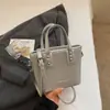 Bolso de Cubo Casual de Moda y Texturizado Nuevo Verano 2025 Elegante Simple de Nicho para Mujer Bolso de Hombro Cruzado