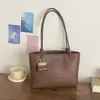 Elegante bolso de mujer de gran capacidad, nuevo modelo de otoño 2026, bolso de hombro simple y versátil para el trabajo y los desplazamientos, bolso tote