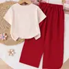 Nuevo conjunto casual deportivo de verano para niñas, de manga corta, holgado y cómodo: top con estampado de moño + pantalones de pierna ancha