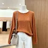 Suéter de punto trenzado hueco para mujer con cuello redondo, nueva colección otoño 2026, estilo holgado y relajado, con un tejido texturizado y afelpado.