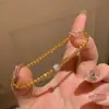 Tienda de Oro Mismo Estilo Deslumbrante Brillante con Perlas y Diamantes Pulsera de Cadena para la Cintura Imitación de Oro Gama Alta Versátil Joyería Simple Modelo Nuevo