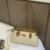 Bolsa de mão de nicho estilo coreano para mulheres, nova moda 2026 simples casual bolsa de ombro, bolsa baguette de grande capacidade para o dia a dia