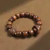 Atacado de fábrica contas de pera amarela de folha grande pulseira de anel giratório pulseira de madeira artesanato presente terço brincar fabricantes