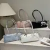 Bolso tote nuevo de estilo coreano, dulce y chic, de gran capacidad, perfecto para ir al trabajo, con una textura dulce y elegante, un diseño simple, y se puede llevar como bolso de hombro o bolso de mano.