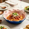 Juego de vajilla de cerámica de color bloque azul nórdico y rosa para uso doméstico, que incluye cuencos, platos, tazas, teteras, platos decorativos y moldes para hornear únicos, disponibles para exportación al por mayor.