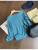 Suéter de punto de manga larga color azul lago con dobladillo sin costuras, diseñado para principios de otoño, favorecedor y de corte holgado, para mujer. 13537