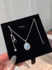 Nuevo Conjunto de Collar con Colgante de Piedra Marina Vintage para Mujer, Nicho de Lujo Ligero, Cadena para Clavícula Azul, Anillo y Pendientes