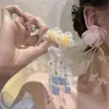 Pendientes hechos a mano con borlas de cuentas de flores estilo vacacional junto al mar pendientes estilo hada estilo Mori atmósfera exagerada pendientes largos