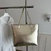 Bolsa de Hombro Cruzada Estilo Coreano Perla Luz Moda Viaje Simple 2026 Gran Capacidad Casual Hombro Único Axila Tote
