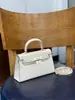 Elegante bolso Kelly con hebilla plateada y diseño de mano 2026 nueva moda para mujer, bolso de mano de segunda generación con hebilla dorada, bolso de hombro y cruzado
