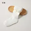 Colección de primavera y otoño transfronteriza: Leggings infantiles con diseño estilo princesa, versátiles para usar como prenda exterior, con rayas verticales y un gran moño, adecuados para niñas