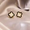 Pendientes de Trébol de Cuatro Hojas con Goteo de Aceite Estilo Fragante de Aguja de Plata Temperamento de Nicho Pendientes de Lujo Ligero Pendientes Elegantes Personalizados de Alta Gama para Mujer