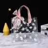 Bolsa de mano personalizada de PVC con láser, con un toque de alta gama estilo ins, adecuada para promoción corporativa, bolsa de hombro de gel colorida y moderna