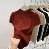 Top de punto de manga corta con cuello semi-alto, estilo veraniego nuevo 2026 para mujer, moda europea con elegantes mangas abullonadas, sensación de alta gama