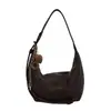 Bolso tipo dumpling simple para mujer, estilo commuter 2026, versátil y moderno, gran capacidad, nuevo bolso cruzado, artículo de temporada de otoño