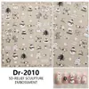 Adesivos de nail art em relevo Redanco5D, apresentando um design muito popular com detalhes em folha de ouro, uma árvore de Natal nevada e motivos de maçã e floco de neve. Dr2011