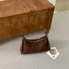 Coleção de outono 2026 transfronteiriça: Bolsa de ombro de alta qualidade e estilosa para mulheres, bolsa transversal estilo retrô da moda coreana, versátil para o dia a dia e pode ser usada sob o braço