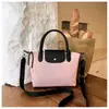 Bolso bandolera versátil para uso diario para mujer, gran capacidad, otoño 2026, estilo minimalista coreano, pequeño y único, adecuado para ir al trabajo