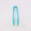 En stock clip de plástico tres en uno traje clip para alimentos puesto clip para comida cocinada clip para snacks pan clip de entrenamiento para niños