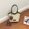 Bolso cubeta de estilo coreano con bloques de color transfronterizo para mujer, bolso cubeta simple de moda nuevo, bolso de hombro cruzado vintage moderno