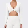 Roupas de Yoga Torcidas Outono e Inverno Europeias e Americanas Manga Longa Camiseta Esportiva de Corrida Feminina Roupa para Cobrir Fitness Pilates Treinamento