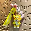 Llavero Colgante de Dibujos Animados Sanrio Llavero Kuromi Puesto de Regalos Mini Máquina de Bolas Colgante Pequeño Artículo