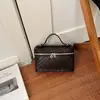 Bolso Cuadrado Pequeño Transfronterizo Fresco de Moda para Mujer, Bolso de Hombro Tejido de Color Sólido Nuevo Otoño 2026, Bolso Cruzado para el Trabajo
