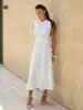 Vestido transfronterizo europeo y americano 2026 primavera-verano nuevo estilo cuello redondo sin mangas tejido texturizado de punto vestido midi plisado