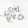 Moda Europeia e Americana Venda Quente Transfronteiriça Brincos Geométricos Vazados Brincos de Aço Titânio Banhados a Ouro High-End Brincos Joias Femininas em Formato de Coração