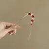 Horquilla de Borla de Flor Roja de Año Nuevo para Mujeres en Otoño e Invierno Nueva Chinoiserie Horquilla de Gama Alta Estilo Antiguo Horquilla de la Dinastía Han Tocado