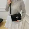 Bolso de Mano Cuadrado Pequeño de Moda 2025 Nuevo Bolso Retro Simple para Mujer de Moda Versátil de Nicho Bolso Cruzado Simple para el Trabajo