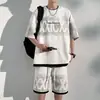 Conjunto de ropa de trabajo estilo americano para hombre, atuendo casual holgado de verano, un conjunto completo de manga corta, nueva marca deportiva de moda 2026 pantalones cortos