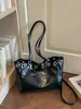 Bolso/bolso de hombro de moda nuevo y versátil con diseño de bloques de color retro de nicho y gran capacidad
