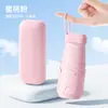 Guarda-chuva de Bolso Dobrável com Argola Oculta Proteção Solar Cola Preta para Sol e Chuva Guarda-sol Cápsula Fabricante de Guarda-sóis Em Estoque