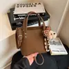 Bolsa de Mão Feminina Novo Modelo 2026 Bolsa de Ombro Fashionável Tendência Bolsa Transversal de Alta Qualidade Versátil Elegante Bolsa Saco