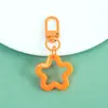 Nuevo llavero de pentagrama hueco de colores, accesorios de hebilla de puerta giratoria, materiales para accesorios de joyería hechos a mano DIY al por mayor