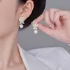 Pendientes elegantes y lujosos de circonita y perla, estilo commuter de lujo ligero, pendientes de botón de flor con goteo de aceite, pendientes exquisitos de moda y versátiles