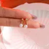 Conjunto de pendientes cruzados nuevo europeo y americano set de 12 piezas pendientes de perlas retro de alta calidad serie simple europea y americana de tres colores