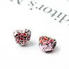 Huiyue DIY rojo hueco gota aceite amor agujero grande cuentas pulsera europea y americana accesorios de cuentas al por mayor