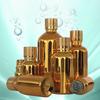 Botella de aceite esencial chapada en oro, botella de vidrio para loción, productos para el cuidado de la piel, subbotella, botella de líquido con esencia dorada, fábrica al por mayor