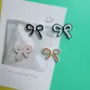 Lindo Adorno de Lazo Bicolor con Goteo de Aceite DIY Tocado Funda de Teléfono Parche Decorativo Pegamento en Crema Agujero para Zapatos Venta al por Mayor