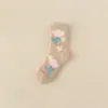 Calcetines de coral no sueltan pelusa con diseño de tulipán para mujer al por mayor, calcetines gruesos de coral para el hogar, dormir, calcetines de piso transfronterizos