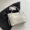 Bolsos de Gran Capacidad para Mujer Primavera y Verano 2026 Nueva Moda Bolso de Hombro para Viajes de Negocios Bolso Tote Cubo de Mano de Alto Valor