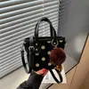 Bolso de mano de lunares de moda transfronterizo para mujer, nuevo bolso cubo de nicho estilo coreano para el día a día, bolso de hombro y cruzado para el día a día