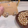 Pendientes Populares de Zirconia de Lujo Ligero para Mujer, Pendientes de Flor Retro Franceses de Alta Gama, Diseño de Nicho y Pendientes con Temperamento