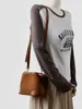 Nova Mini Bolsa Saco Retro Maillard Fashion em Couro Fosco com Cordão, com Acabamento de Luxo e Versátil para Ombro