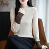 Apoyando la venta al por mayor de suéteres de punto beige cómodos, de corte holgado y estilo relajado, perfectos para usarlos en capas en otoño e invierno, con un diseño retro de cuello medio para mujer