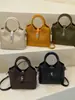 Bolso tipo cubo de alta gama transfronterizo de nicho, bolso cruzado moderno y versátil, bolso de mano casual y simple, bolso de hombro, bolso para el trabajo