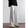 Novas calças casuais de corte solto para homens 2026, estilo coreano, modernas e versáteis, finas e leves para verão e outono, com um design de perna larga e fluido que cai elegantemente