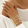 Conjunto de Pulsera y Anillo Dorados Inspirados en el Diseño Europeo y Americano Transfronterizo, Moderno y Único, Exagerado Estilo Abierto Joyería de Lujo Ligero Conjunto de Dos Piezas